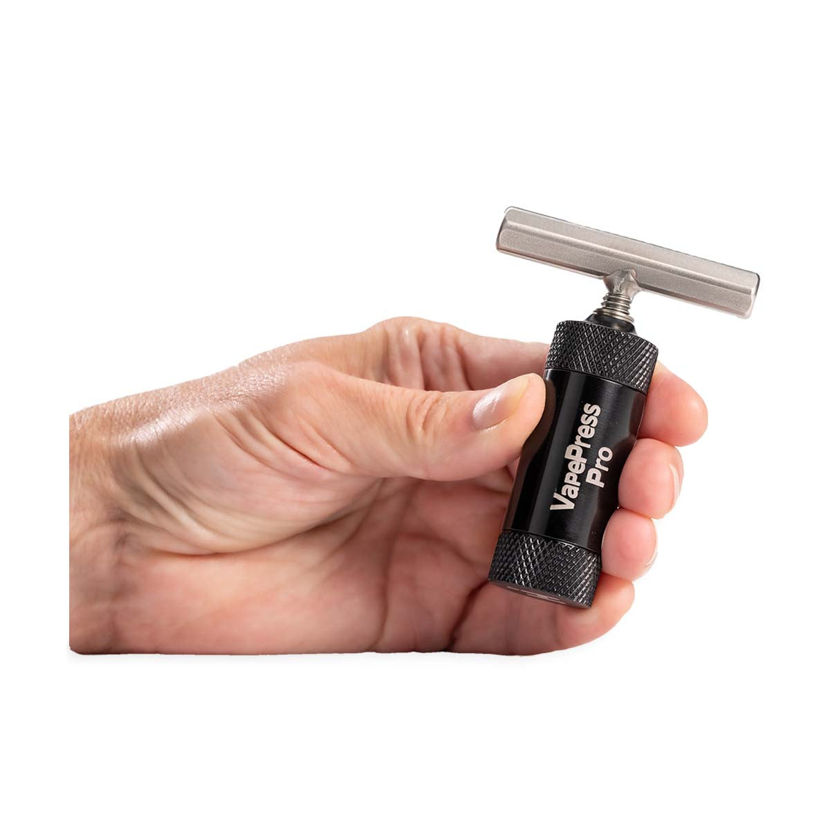 vape press pro black for pax in hand.jpg vape press pro black for pax in hand.jpg